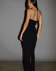 TOP: Black Ribbed knit tank top. Adjustable halter tie neckline. Rosette details. Side slit. Unlined.
BOTTOM: Black Ribbed knit maxi skirt. Elastic waist. Back slit. Unlined.
Black set. holiday outfit. christmas outfit. nice christmas outfit
