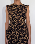 Animal printed smocked tiered skirt. Elastic waistband. Shorts lining. leopard mini skirt. cheetah mini skirt. going out skirt. summer skirt. spring skirt