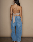 Barrel leg jeans. Button fly. Five pocket construction. Unlined. medium wash jeans.