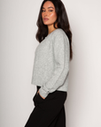 Fuzzy knit cardigan. Front button down closures. Unlined. grey knit cardigan. grey oversized cardigan