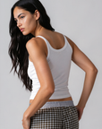 Ribbed knit tank top. Elastic neckline. Unlined. Basic tank top. white tank top. basic white tank top