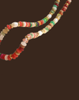 Multicolored beaded necklace on a dark background
colorful necklace