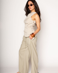 Woven wide leg pants. Elastic waist with drawstring closure. Side pockets. Back pocket. Unlined. resort wear. lounge wear. resort vacation pants. flowy pants. linen pants