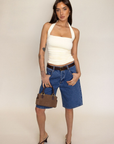 Mid rise jorts shorts
Relaxed and wide leg design
Button fly
Rigid denim does require some time to 'wear in'
