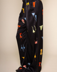 Satin wide leg pants
Bikini graphic printed
Elastic waistband with faux tie
Faux back pocket
Unlined
black bikini graphic pants
beach cover up
swim cover up