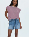 Mid-rise denim short
Medium length
Relaxed fit
Medium blue denim wash
Whiskering and a frayed, distressed hem