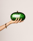 green Hardshell marble clutch
Magnetic closure
Acrylic chain straps with heart detail
Removable long and short chain
Synthetic