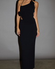 TOP: Black Ribbed knit tank top. Adjustable halter tie neckline. Rosette details. Side slit. Unlined.
BOTTOM: Black Ribbed knit maxi skirt. Elastic waist. Back slit. Unlined.
Black set. holiday outfit. christmas outfit. nice christmas outfit