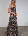 Animal printed chiffon maxi dress. Adjustable straps. Side hook and eye and zipper closures. Back tie and button closures. Fully lined. leopard maxi dress. fall maxi dress