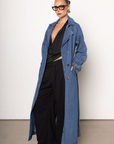 Denim long line trench coat
Adjustable and removable belt
Double breasted button down closure
Unlined
blue denim trench coat