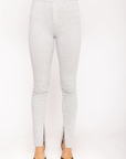 Jersey stretch split hem leggings
Button fly closure
Zipper slit hem
Unlined
light grey legging pants with inner size zipper on hem