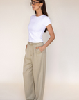 tan beige High waisted trouser pant
Belt loops
Eyelet and zipper closure
Front pleats
2 side pockets
2 faux back pockets
Unlined
work trouser pants
cute office attire
dressed up outfit