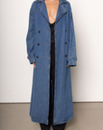 Denim long line trench coat
Adjustable and removable belt
Double breasted button down closure
Unlined
blue denim trench coat