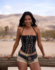 black Embroidered knit corset
Adjustable halter tie neck
Front lace up closure
Back hook and eye and zipper closures
Fully lined
Studded details
coachella top outfit
stagecoach top outfit
festival top outfit