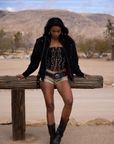 black Embroidered knit corset
Adjustable halter tie neck
Front lace up closure
Back hook and eye and zipper closures
Fully lined
Studded details
coachella top outfit
stagecoach top outfit
festival top outfit