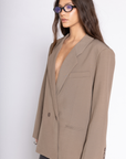 Oversized single breasted blazer
Collar neckline
Long sleeves with button closures
Front button down closure
Front pockets
Back slit
Fully lined
Length: 28"
Polyester/Spandex
tan beige oversized blazer jacket