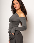 Grey knit top. Asymmetric neckline. Long sleeves. Ruched side. Unlined. going out top. grey going out top. nice dinner top.