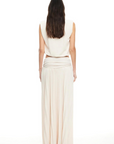 Knit maxi skirt. Elastic wide waistband. Pleated skirt. Fully lined. Slightly sheer. white mxi skirt. white lioness skirt.