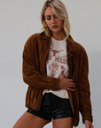 Vegan leather shorts. Hook and eye and zipper fly. No pockets. Unlined. black faux leather shorts. fall shorts. fall outfit.