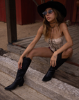 Embroidered knit corset
Adjustable halter tie neck
Front lace up closure
Back hook and eye and zipper closures
Fully lined
Studded details
Coachella outfit
Stagecoach outfit
Festival Outfit