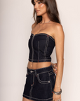 Structured strapless bustier crop top
Dark rinse wash
Sculpted princess neckline
Front zip closure
Contrast stitching
Stretch denim
Make sure to buy it tight or true to size as the denim will relax over time
Length: 10.5"
Cotton/Polyester/Elastane