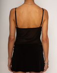 Sheer cami tank top
Adjustable straps
Faux front tie
Ruffle detailing
Side zipper
Unlined/sheer
black sheer tank top
going out top
going out outfit