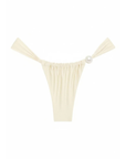 cream Satin bikini bottom
Minimal Coverage
Low-Rise Bikini Bottom
Elongated High-Cut Leg
Large, Adjustable, Pearl Detailing
Wear Higher on Hips to Elongate Legs
80% Recycled Nylon 20% Spandex Fabric