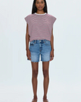 Mid-rise denim short
Medium length
Relaxed fit
Medium blue denim wash
Whiskering and a frayed, distressed hem