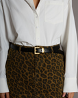 Leather belt. Square buckle. Adjustable.