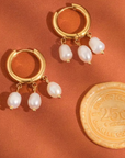 18K Gold Non-Tarnish Three Petite Pearl Dangle Earring
18K Gold Plating
Stainless Steel
Freshwater Pearl
Measurement (L x W inch): 1.1 x 0.5
Lead-free
Nickel-safe
Hypoallergenic
Water Resistant