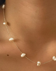 Petite dainty pearl necklace
18K Non-Tarnish
18K Gold Plating
Stainless Steel
Faux Pearl Pendant: 0.28"
Chain Length:14.76"
Extension Length:1.96"
Lead and Nickel Free
Hypoallergenic
Water Resistant