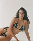 Skimpy polka dot cinch string bikini bottom
Side string tie side
Made from matte Italian supplex
