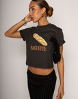 black Graphic printed cropped t-shirt
Crewneck neckline
Short sleeve
Unlined
baguette tee
summer tee