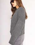 Fuzzy knit cardigan
Crewneck
Front button down closures
Long sleeves
Dark grey cardigan
Charcoal grey cardigan