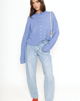 Fuzzy knit cardigan
Crewneck
Front button down closures
Long sleeves
Unlined
blue cardigan