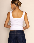 white Ribbed tank top
Regular fit
Scoop neck
Sleeveless
Midweight