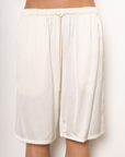 Satin longline shorts/jorts
Adjustable drawstring
Elastic waistband
Side pockets
Unlined
cream ivory satin long line shorts
cream ivory satin jorts