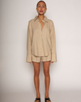 Tan Linen woven long sleeve collared top
Button down closure
Front pocket
Button closure on sleeves
Unlined
Resort lounge wear