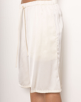 Satin longline shorts/jorts
Adjustable drawstring
Elastic waistband
Side pockets
Unlined
cream ivory satin long line shorts
cream ivory satin jorts