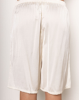 Satin longline shorts/jorts
Adjustable drawstring
Elastic waistband
Side pockets
Unlined
cream ivory satin long line shorts
cream ivory satin jorts