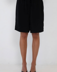 black Satin shorts
Satin jorts
Elastic adjustable waistband
Side pockets
Lined