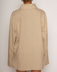 Tan Linen woven long sleeve collared top
Button down closure
Front pocket
Button closure on sleeves
Unlined
Resort lounge wear