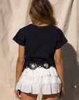 white lace detailing mini skirt with inner shorts. stagecoach skirt outfit. country concert outfit. festival outfit