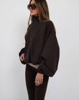 brown Windbreaker long sleeve jacket
Zip up closure
Rollable hood with zip closure
Adjustable drawstring hem and sleeve hem
Partially lined
fall transition outfit