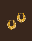 18K Gold Non-Tarnish Braided Hoop Earring
18K Gold Plating
Stainless Steel