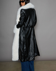 Faux leather longline coat. Faux fur trim. Collar neckline. Long sleeves. Open front. Tie waist. Fully lined. black leather coat. fur coat. coat for winter. cute leather coat. fashionable leather coat