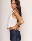 white Linen one shoulder top
Asymmetrical hem
Broderie trim
Adjustable back tie
Unlined/sheer
