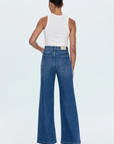 Relaxed, ultra wide leg silhouette
High rise waist
Comfort stretch denim
Waist: 26" / Rise: 12" / Length: 33"
Cotton/Spandex
medium wash blue denim jeans