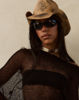 Wrap-style sunglasses
Sleek, sporty silhouette
Glossy black frame
Dark smoke lenses
Curved profile