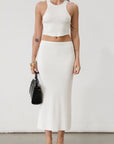 Textured ribbed knit cropped tank top. Racer back. Unlined. Textured ribbed knit maxi skirt. Elastic waist. Unlined. Basic set. white set. cream set. white skirt set. cream skirt set. summer outfit. cute summer outfit